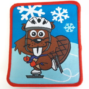 Badge castor qui patine