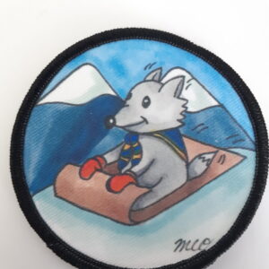 Badge de camp d'hiver louveteau sur luge