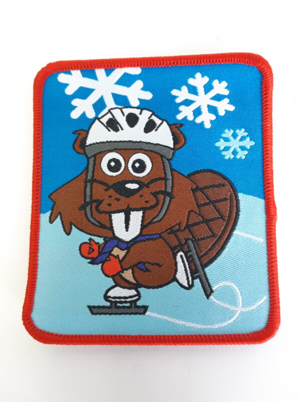 Badge castor qui patine