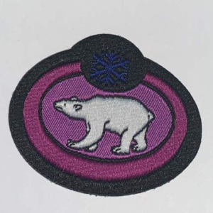 Brevet ours polaire rouge camping léger