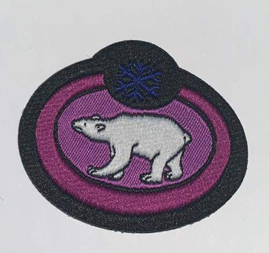 Brevet ours polaire rouge camping léger