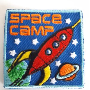 Badge de camp spatial