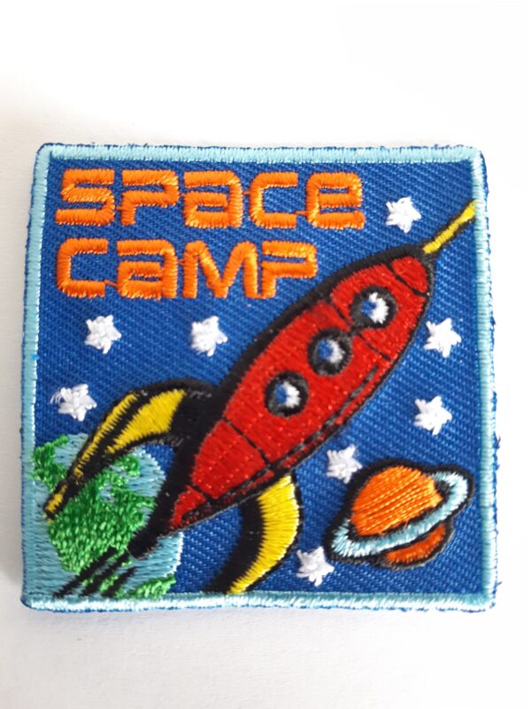 Badge de camp spatial