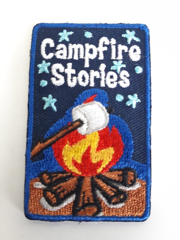 Badge de camp histoire de feu de camp